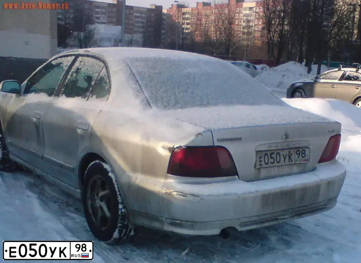 Фото автомобиля MITSUBISHI GALANT, 2001 — госномер Н136АС10. Цвет: ЧЕРНЫЙ