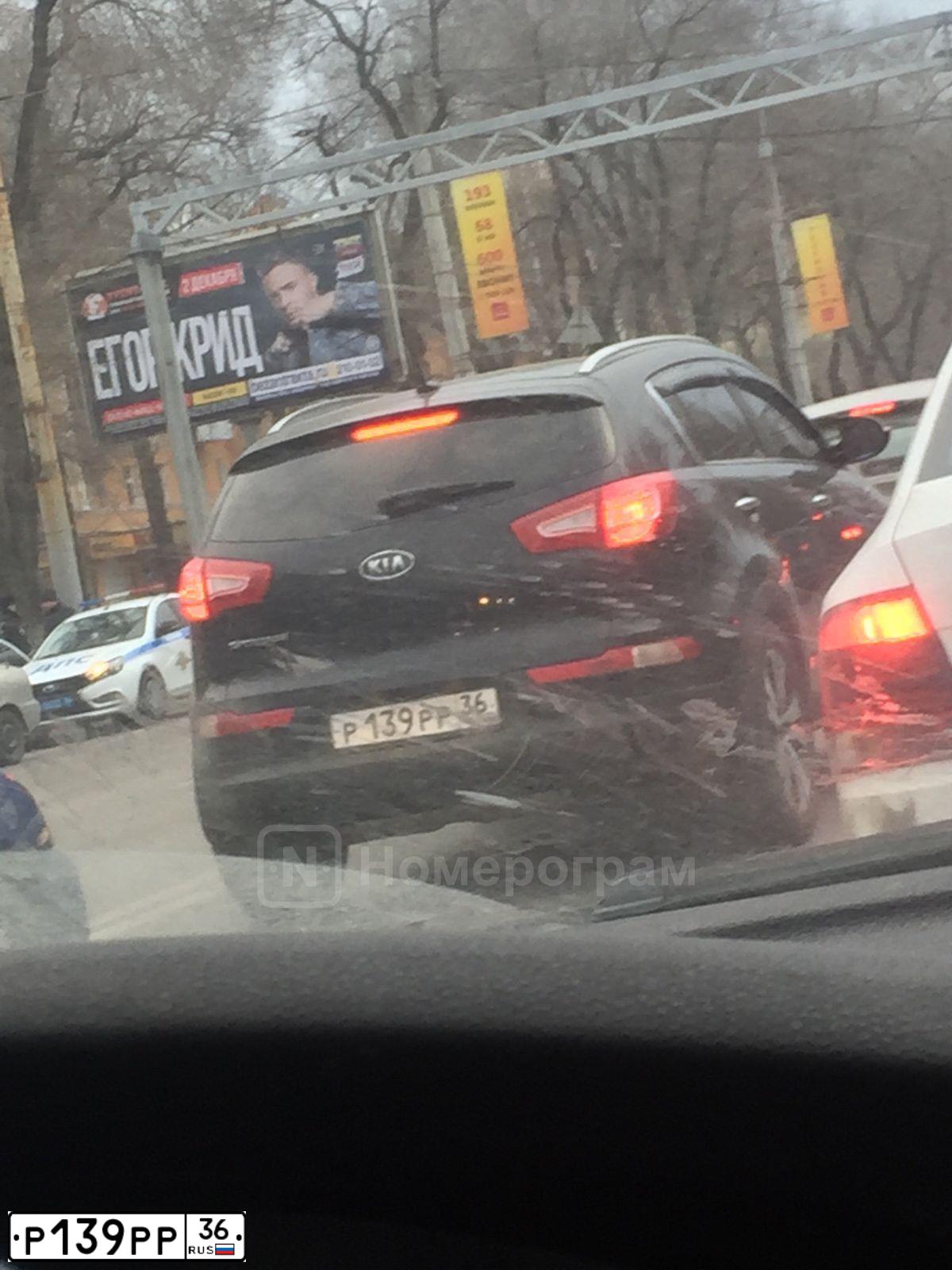 Фото автомобиля KIA SPORTAGE, 2011 — госномер Е025РК186. Цвет: ЧЕРНЫЙ