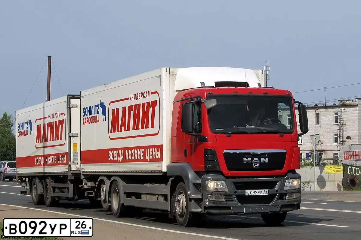Фото автомобиля MAN TGS 26.XXX /6X2/, 2011 — госномер В635ХН790. Цвет: КРАСНО-БЕЛЫЙ