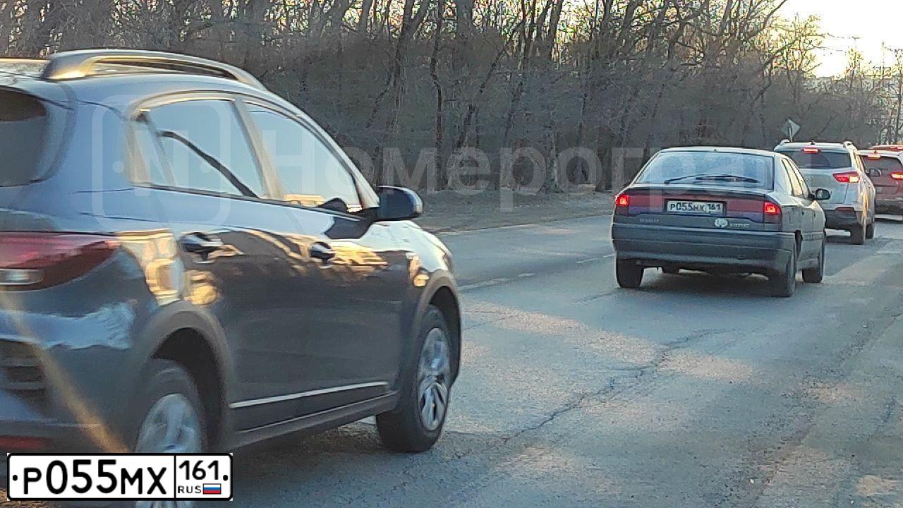 Фото автомобиля MITSUBISHI LANCER, 2008 — госномер Т028МК123. Цвет: БЕЖЕВЫЙ