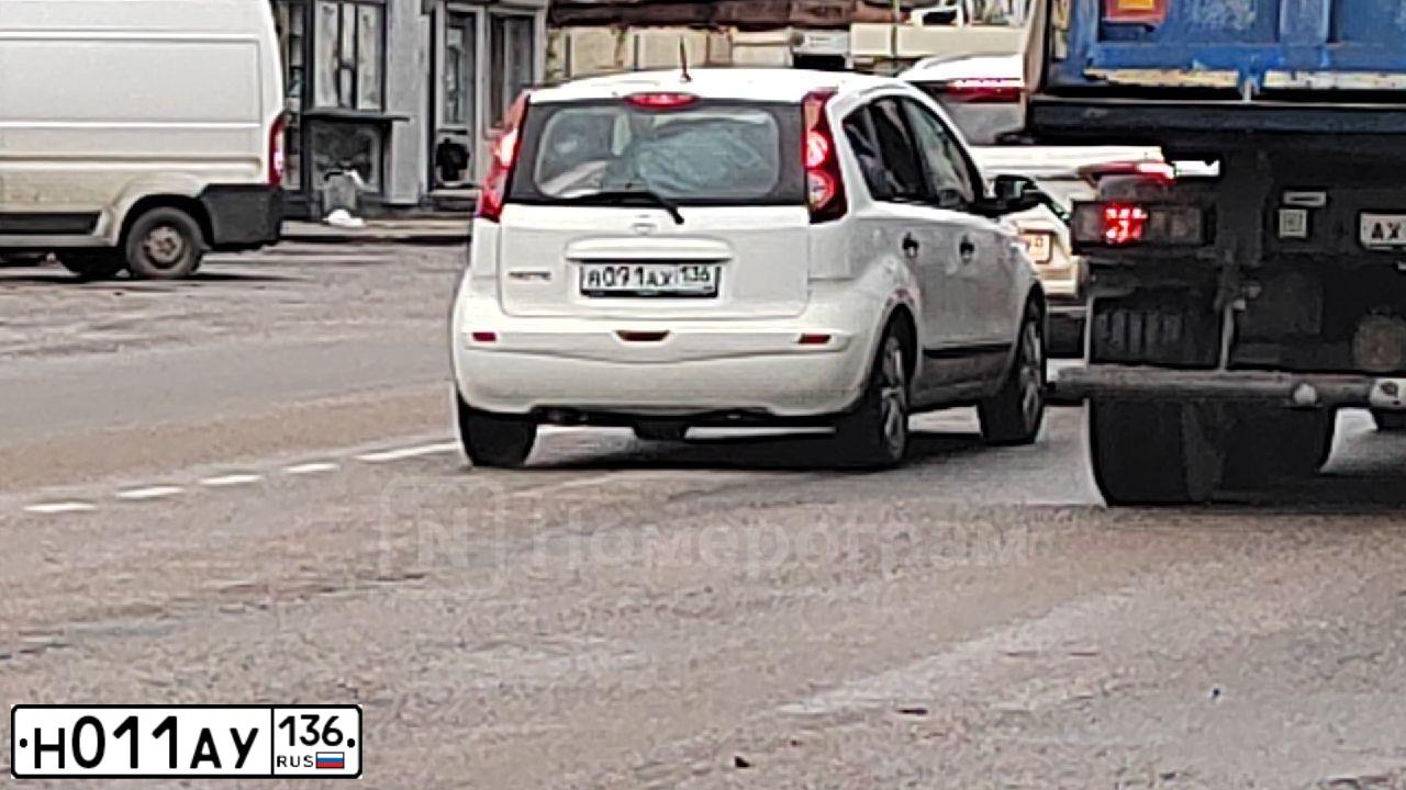 Фото автомобиля OPEL ASTRA, 2012 — госномер Н011АУ136. Цвет: Красный