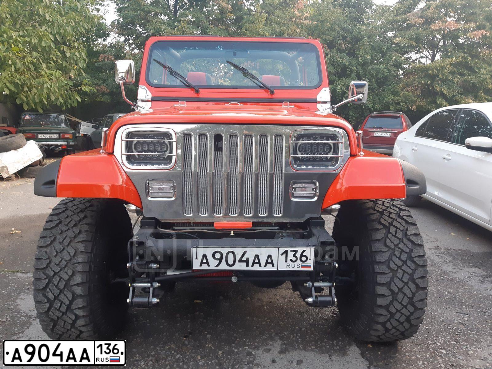 Фото автомобиля JEEP WRANGLER, 1993 — госномер А904АА136. Цвет: Красный
