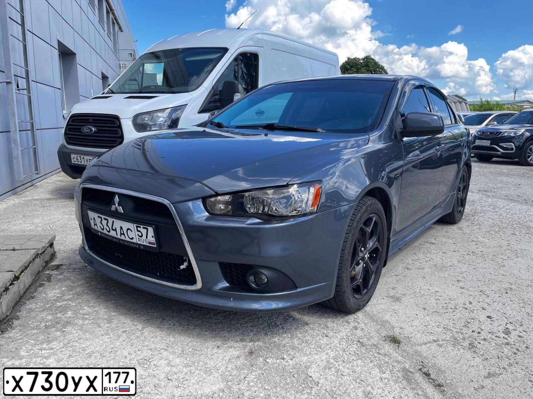 Фото автомобиля MITSUBISHI LANCER, 2007 — госномер Н760ОС32. Цвет: СЕРЫЙ