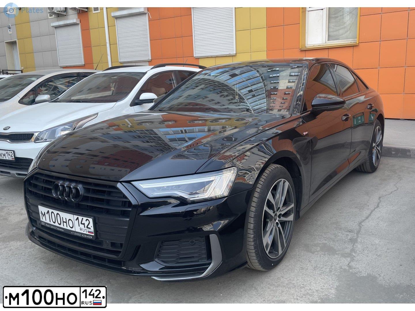 Фото автомобиля AUDI A6, 2021 — госномер Р900МН70. Цвет: ЧЕРНЫЙ