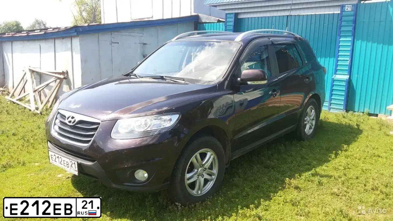Фото автомобиля HYUNDAI SANTA FE, 2010 — госномер С569НО152. Цвет: ТЕМНО-ВИШНЕВЫЙ