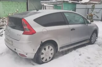 Фото автомобиля CITROEN C4, 2005 — госномер Р017КА72. Цвет: Серебристый