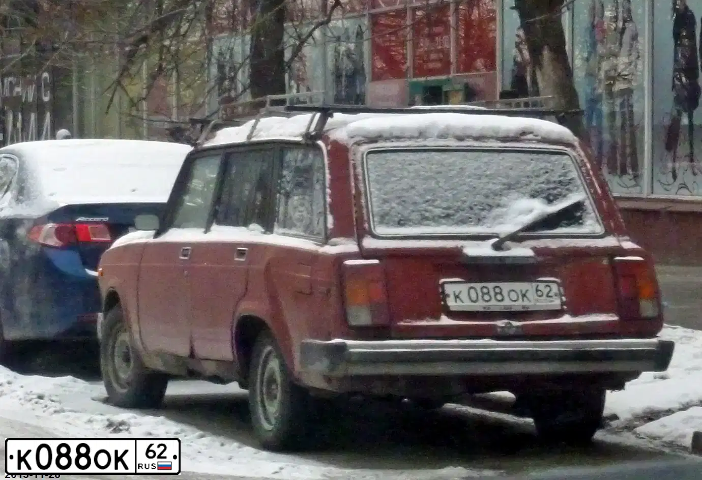 Фото автомобиля LADA 2115 SAMARA, 2009 — госномер К086ОК62. Цвет: ТЕМНО-ЗЕЛЕНЫЙ