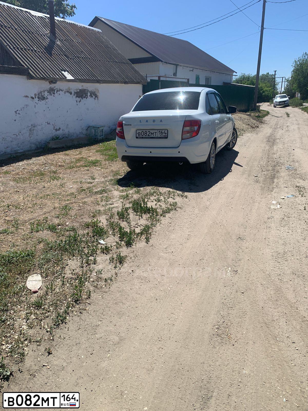 Фото автомобиля LADA GRANTA, 2019 — госномер М700МН164. Цвет: Белый