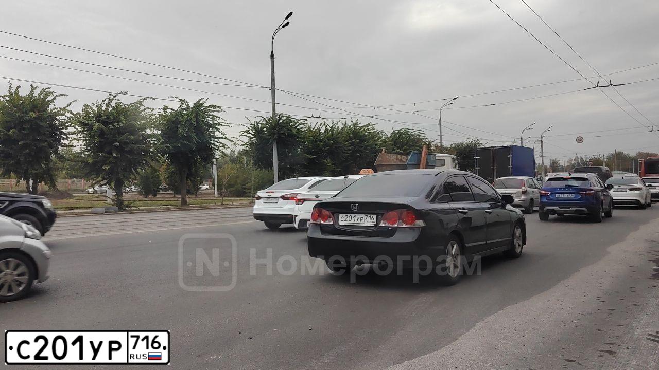 Фото автомобиля HONDA CIVIC, 2007 — госномер С201УР716. Цвет: ЧЕРНЫЙ