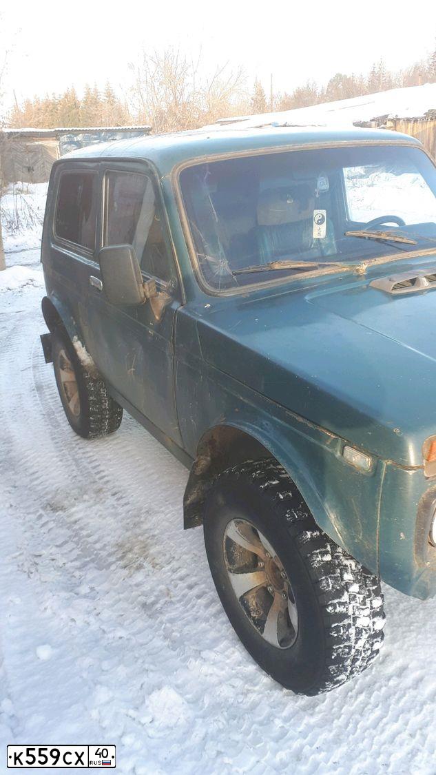 Фото автомобиля LADA 2121 NIVA, 2001 — госномер К559СХ40. Цвет: СИНЕ-ЗЕЛЕНЫЙ