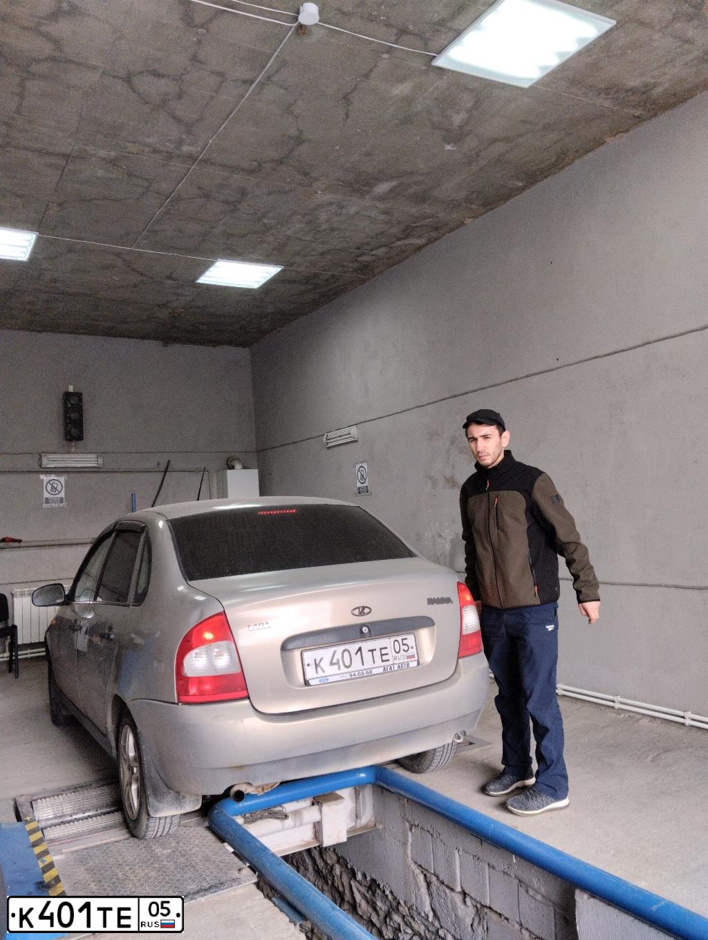 Фото автомобиля LADA 1118 KALINA, 2005 — госномер К401ТЕ05. Цвет: БЕЖЕВО-СЕРЫЙ