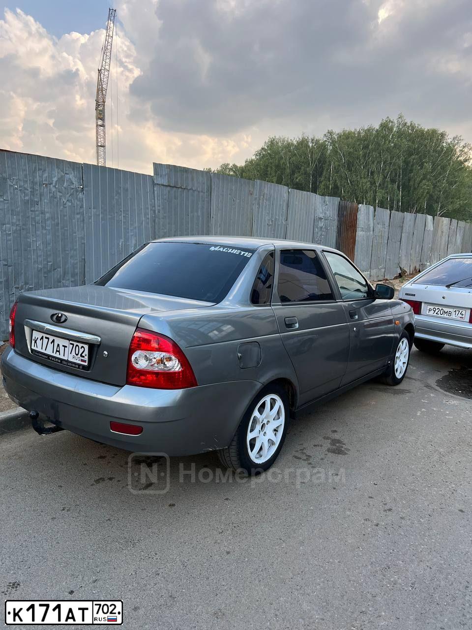 Фото автомобиля LADA 2170 PRIORA, 2007 — госномер М704ВТ774. Цвет: СРЕДНИЙ СЕРО-ЗЕЛЕНЫЙ