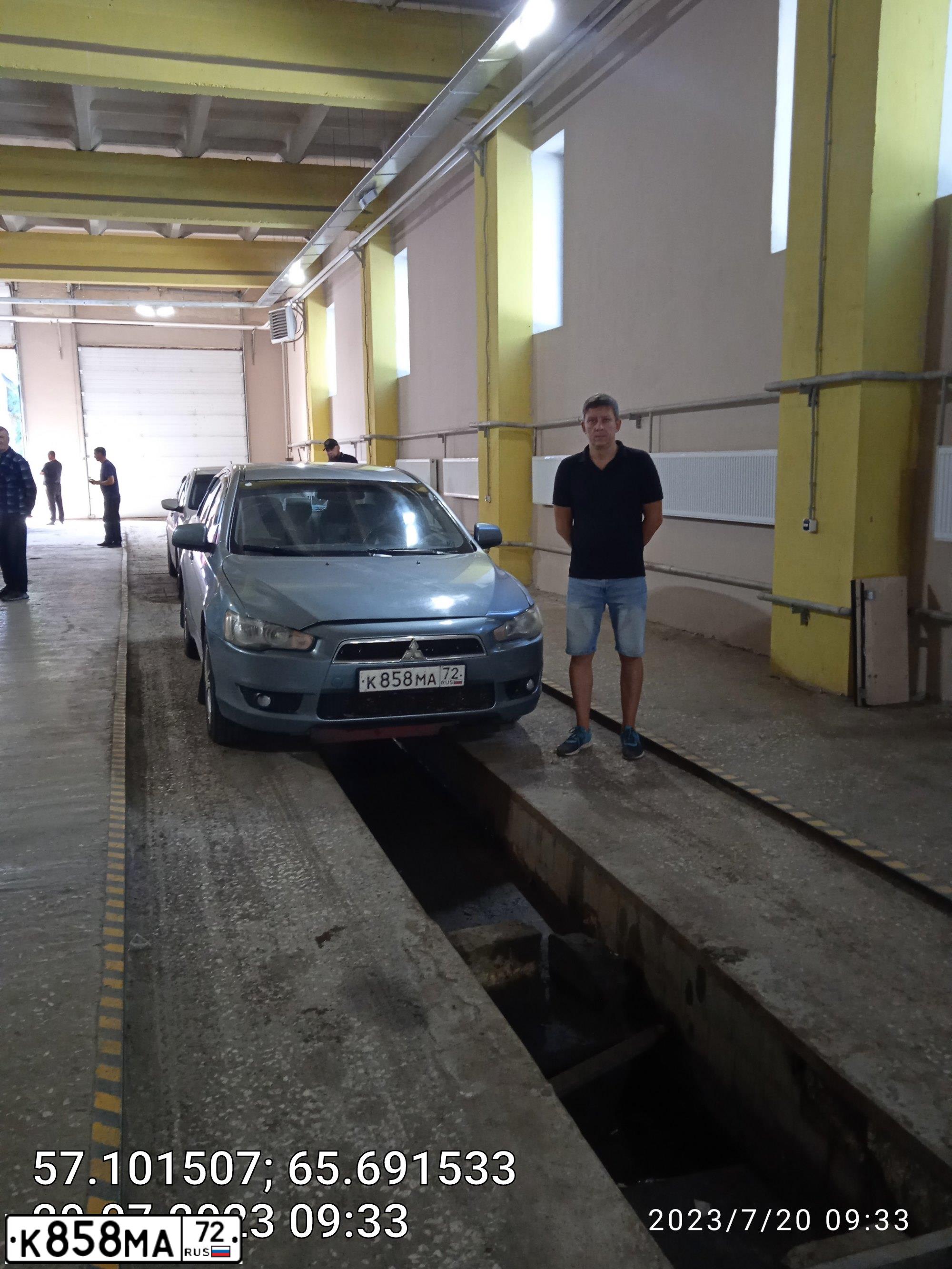 Фото автомобиля MITSUBISHI LANCER, 2007 — госномер К858МА72. Цвет: СВЕТЛО-СЕРО-ЗЕЛЕНЫЙ