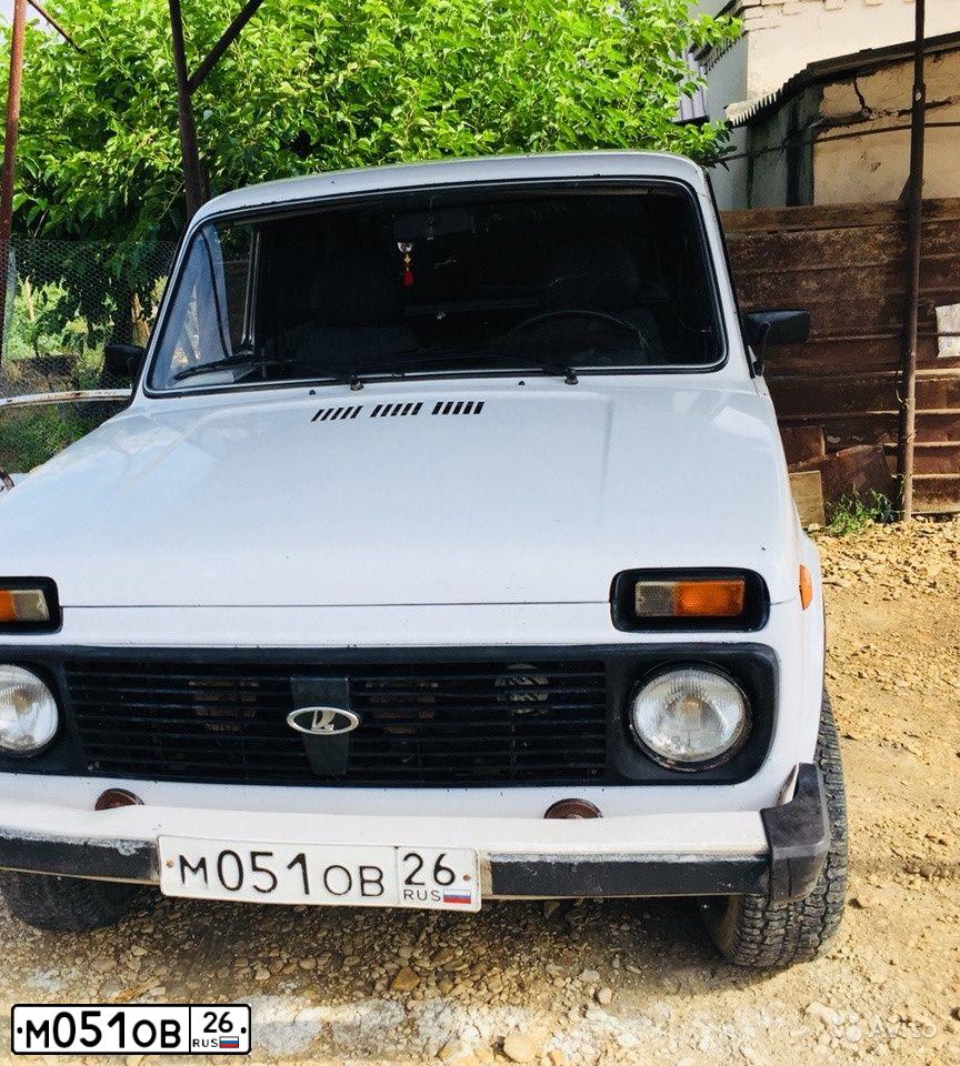 Фото автомобиля LADA 2121 NIVA, 2008 — госномер М051ОВ26. Цвет: ЯРКО-БЕЛЫЙ