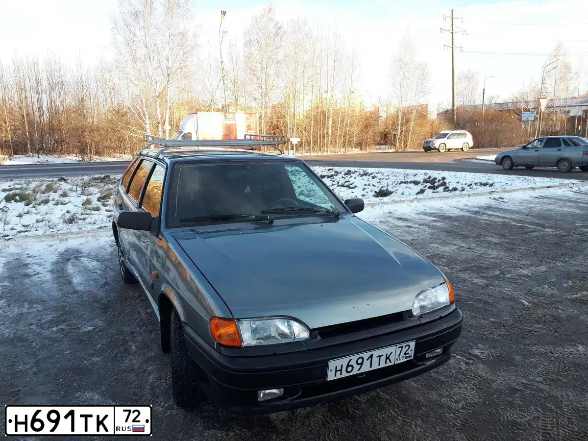 Фото автомобиля LADA 2114 SAMARA, 2011 — госномер Н691ТК72. Цвет: СЕРО-ЗЕЛЕНЫЙ