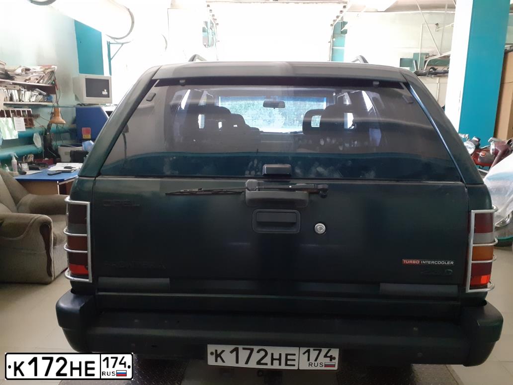 Фото автомобиля OPEL FRONTERA, 1994 — госномер В878КК774. Цвет: ЗЕЛЕНЫЙ