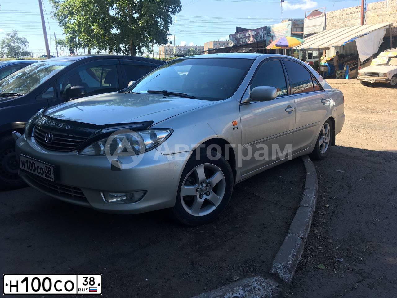 Фото автомобиля TOYOTA CAMRY, 2011 — госномер Н868СТ38. Цвет: БЕЛЫЙ