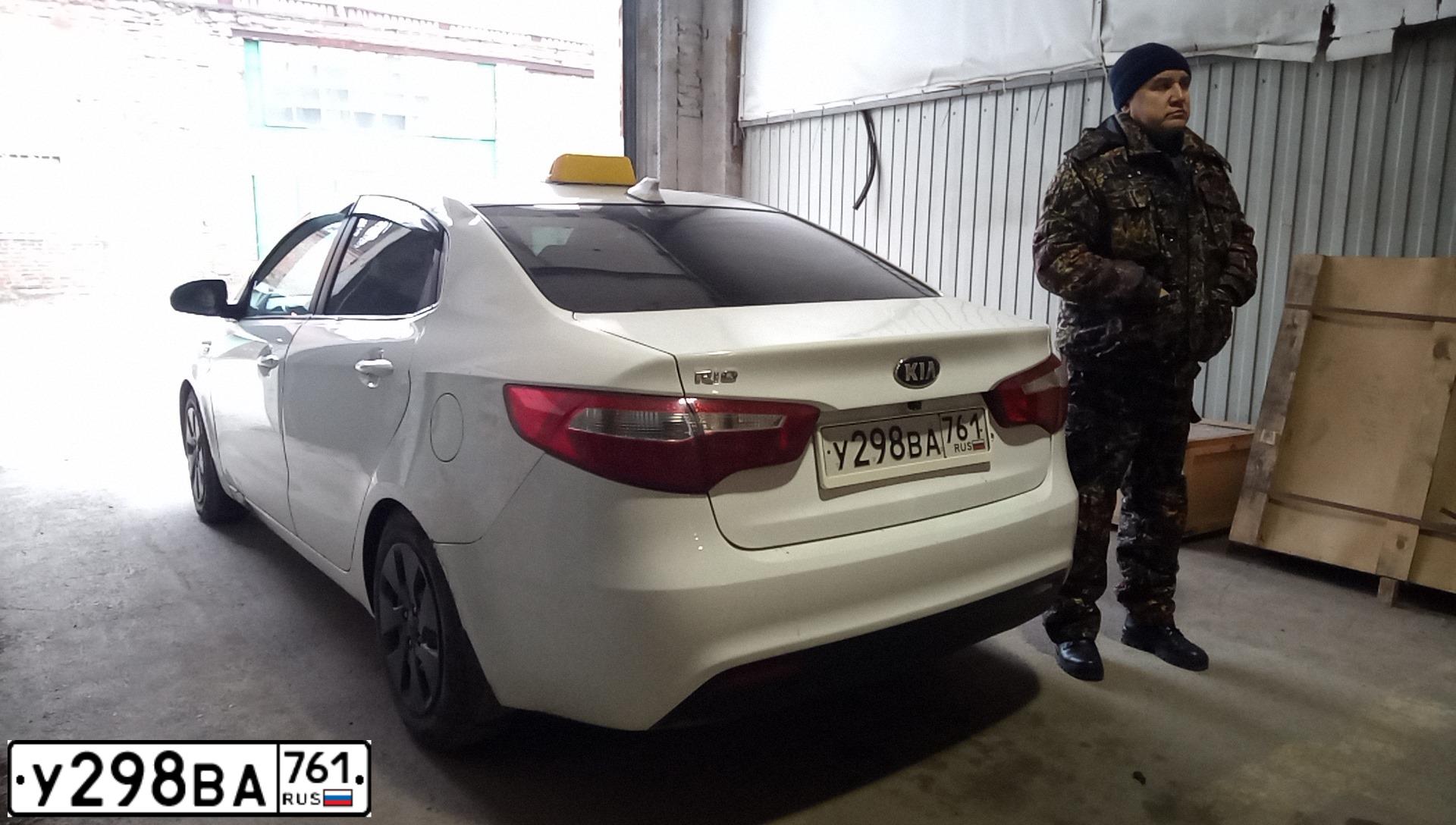 Фото автомобиля KIA RIO, 2014 — госномер У298ВА761. Цвет: Белый