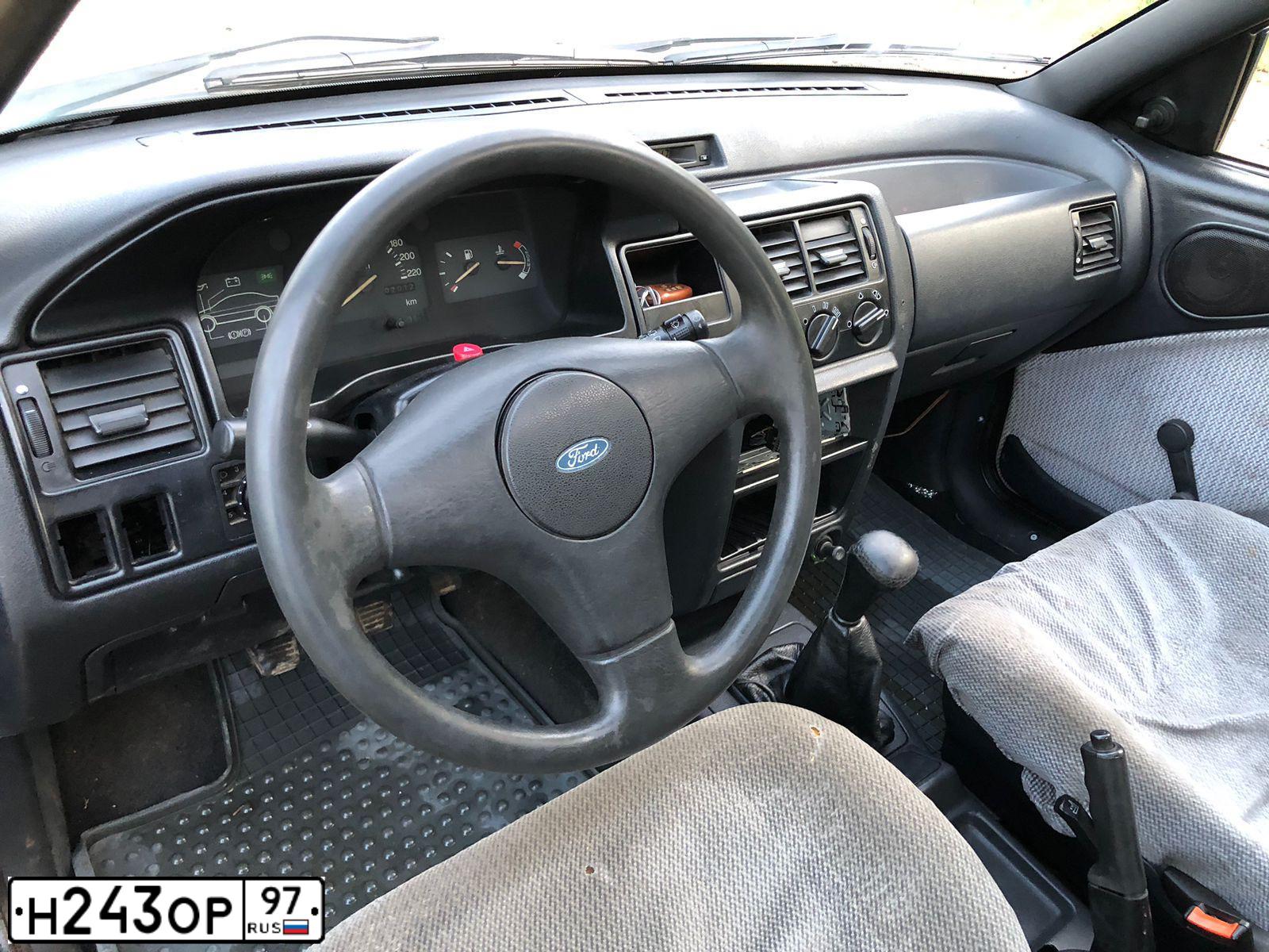 Фото автомобиля FORD ESCORT, 1991 — госномер Н243ОР97. Цвет: ЧЕРНЫЙ