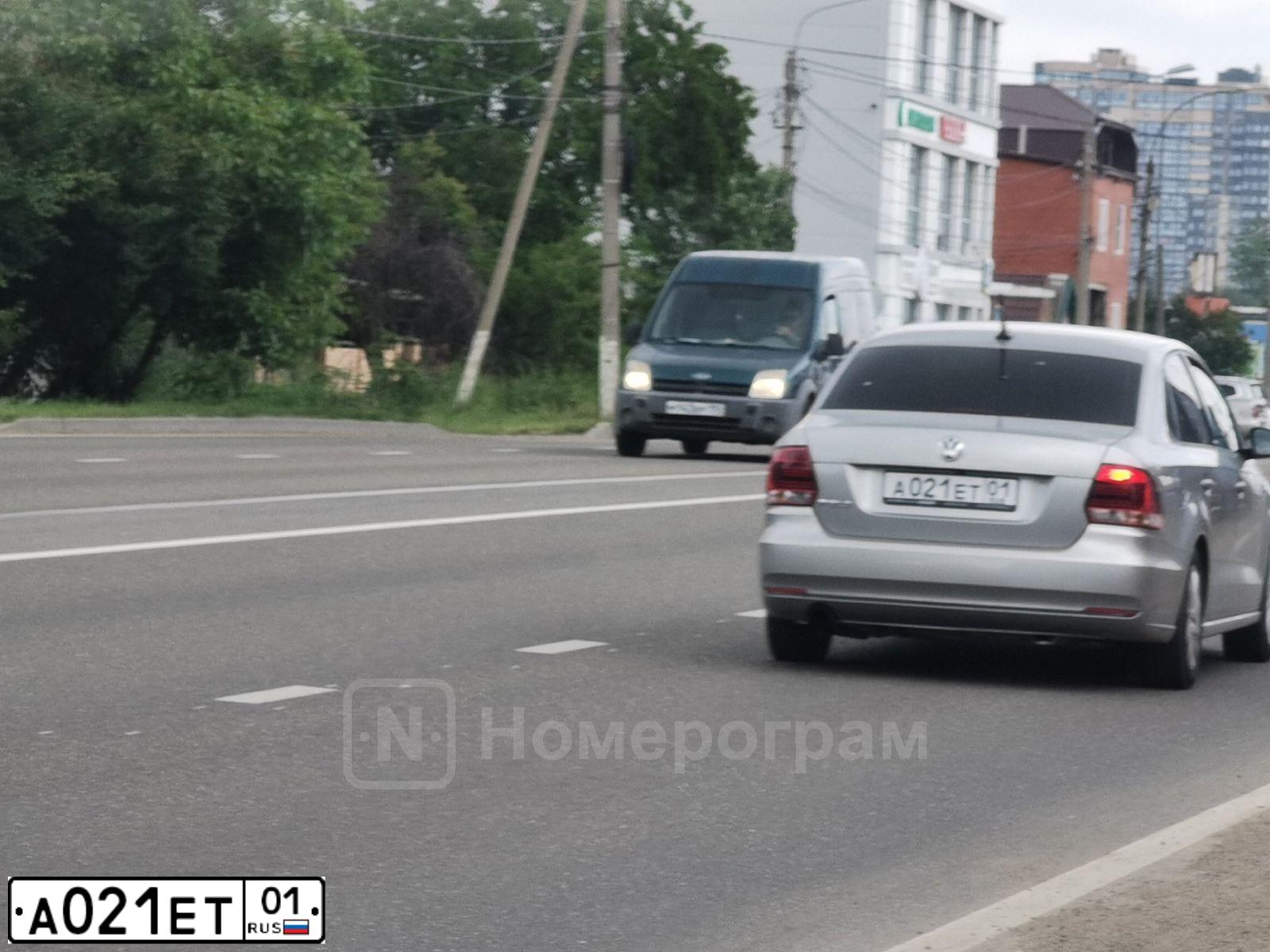 Фото автомобиля LADA 2112, 2006 — госномер А021ЕТ01. Цвет: ЧЕРНЫЙ