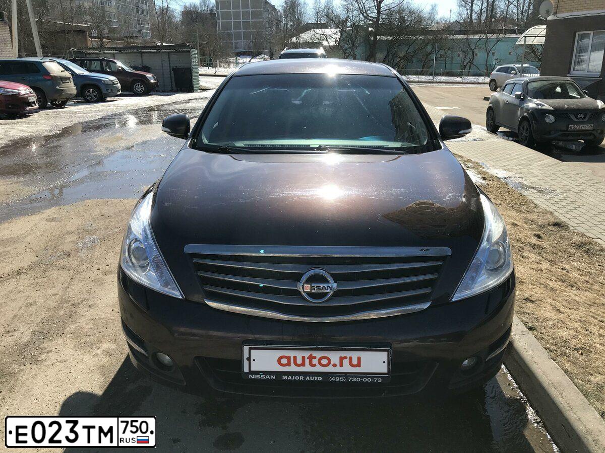 Фото автомобиля NISSAN JUKE, 2018 — госномер Е023ТМ750. Цвет: ЧЕРНЫЙ