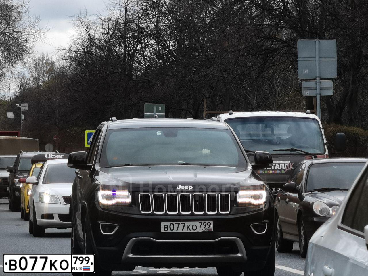 Фото автомобиля JEEP GRAND CHEROKEE, 2014 — госномер С364МВ777. Цвет: ЧЕРНЫЙ