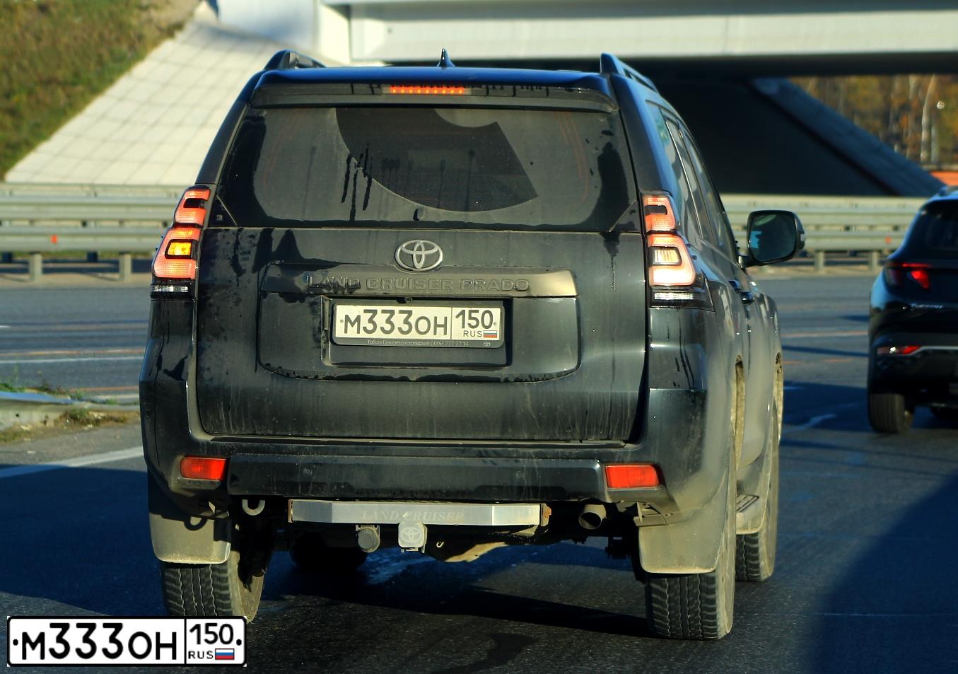 Фото автомобиля TOYOTA LAND CRUISER 150 GRJ150L GКТЕКХ, 2021 — госномер О101ТЕ33. Цвет: ЧЕРНЫЙ