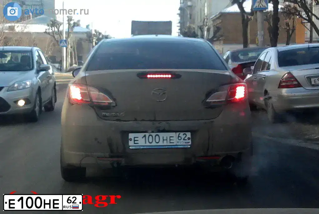 Фото автомобиля MAZDA 6, 2007 — госномер Е100НЕ62. Цвет: ЧЕРНЫЙ
