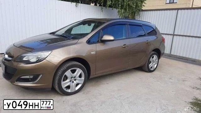 Фото автомобиля OPEL ASTRA, 2012 — госномер К202МХ30. Цвет: БЕЖЕВЫЙ