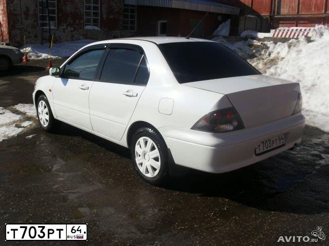 Фото автомобиля MITSUBISHI LANCER, 2001 — госномер Т703РТ64