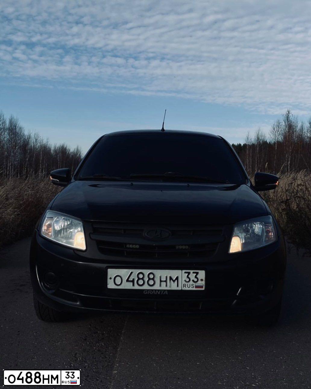 Фото автомобиля LADA GRANTA, 2013 — госномер М885НТ21. Цвет: Сине-Черный