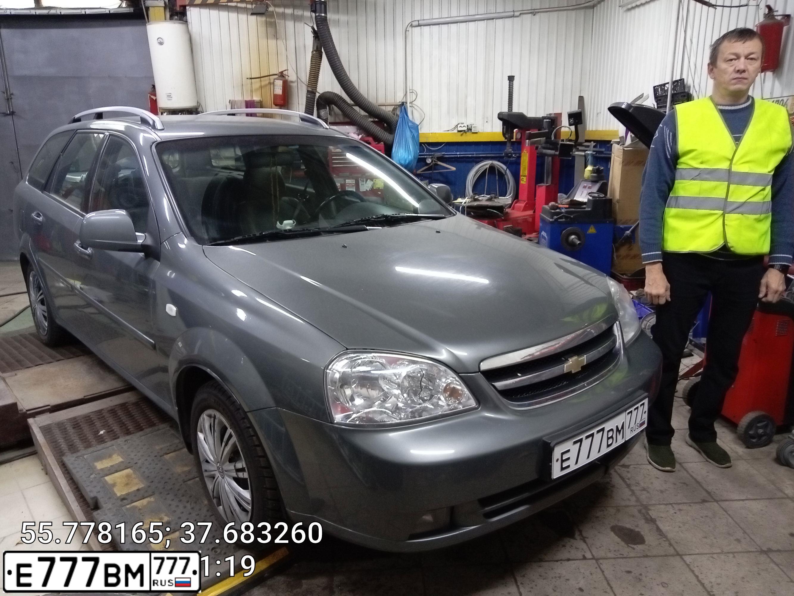 Фото автомобиля CHEVROLET LACETTI, 2010 — госномер Е777ВМ777. Цвет: СЕРЫЙ