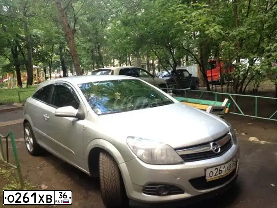 Фото автомобиля OPEL ASTRA, 2008 — госномер О261ХВ36. Цвет: СЕРЕБРИСТЫЙ