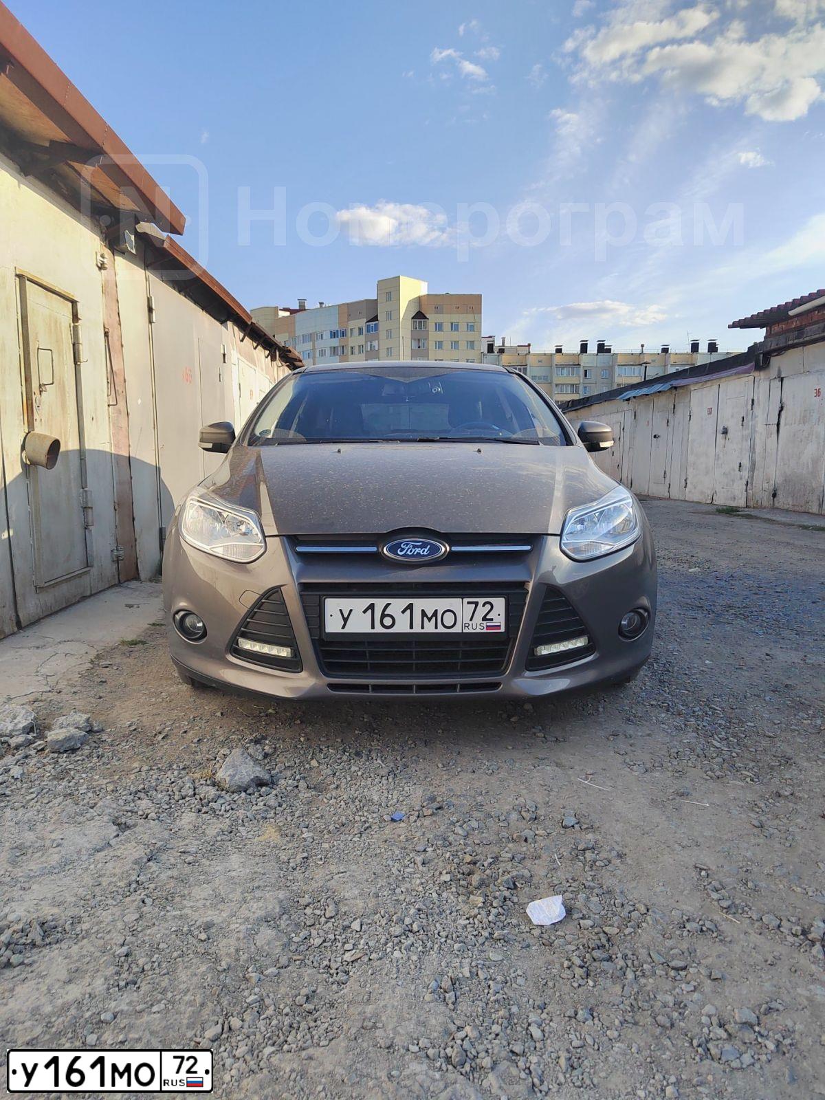 Фото автомобиля FORD FOCUS, 2012 — госномер У161МО72. Цвет: СЕРО-КОРИЧНЕВЫЙ