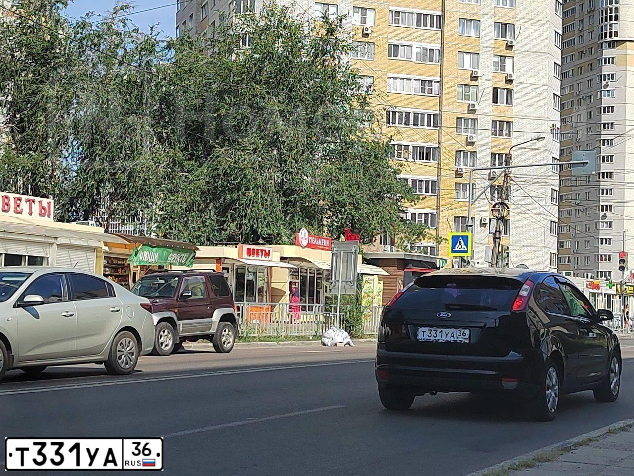 Фото автомобиля FORD FOCUS, 2006 — госномер Т331УА36. Цвет: ЧЕРНЫЙ