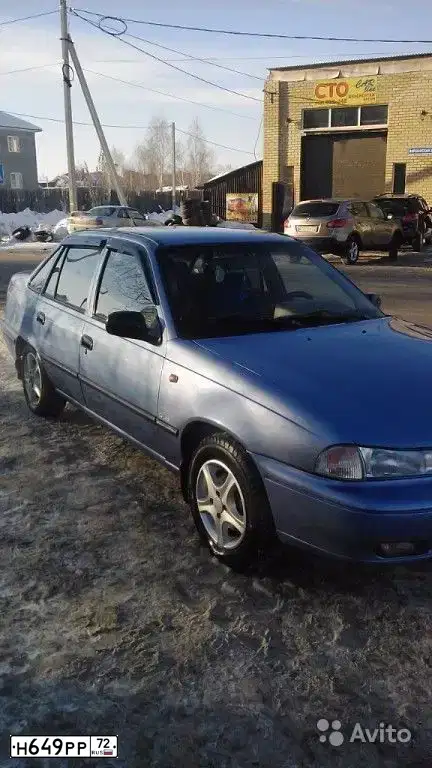 Фото автомобиля DAEWOO NEXIA, 2006 — госномер Н649РР72. Цвет: Перламутрово-голубой