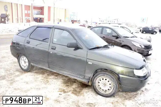 Фото автомобиля LADA 2112 LADA, 2006 — госномер Р948ВР21. Цвет: ЗОЛОТИСТЫЙ ТЕМНО-ЗЕЛЕНЫЙ