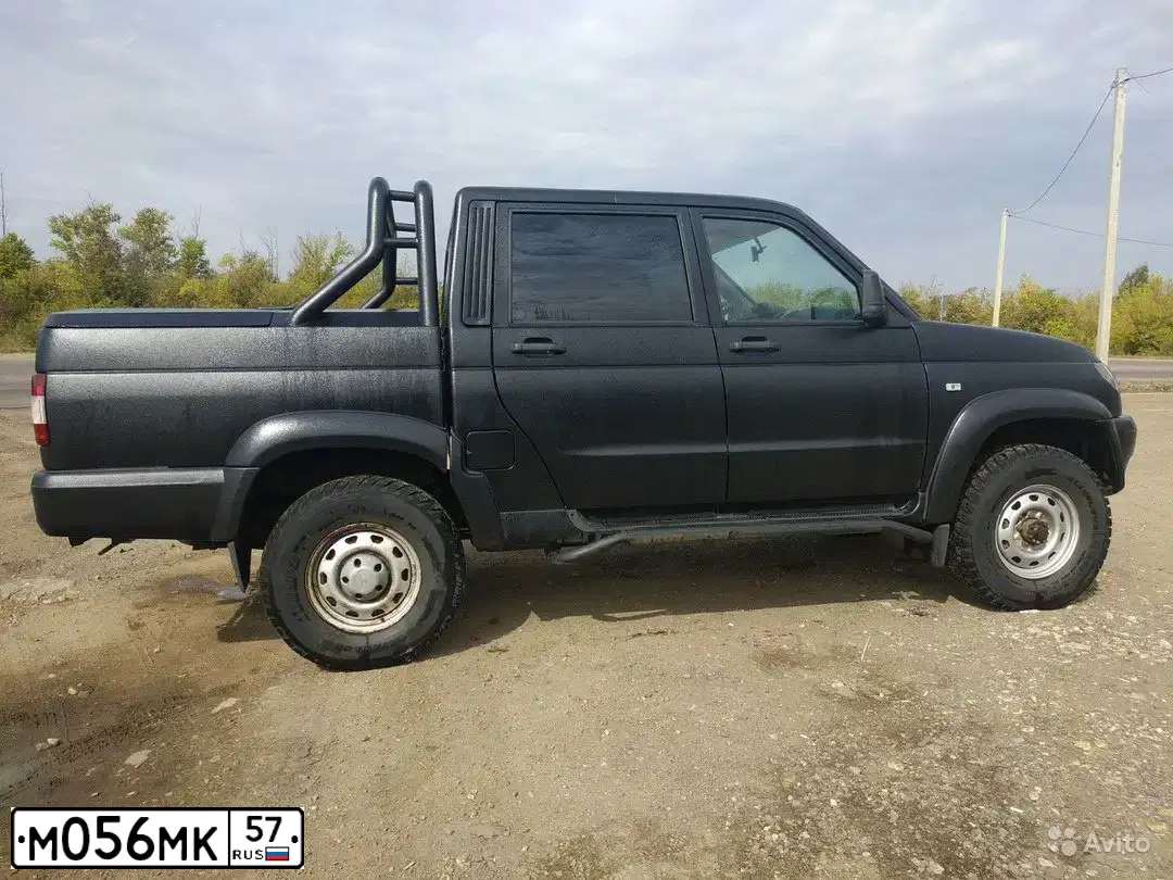 Фото автомобиля UAZ Z 2363 PICKUP, 2013 — госномер С488ТН76. Цвет: ЧЕРНЫЙ