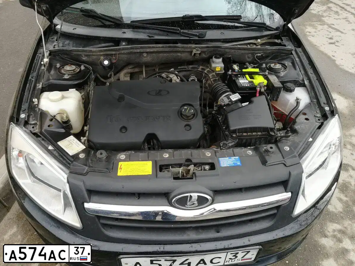 Фото автомобиля LADA 2190 GRANTA, 2012 — госномер К687МР35. Цвет: СИНЕ-ЧЕРНЫЙ