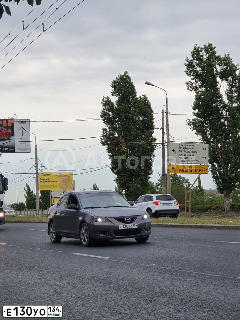 Фото автомобиля MAZDA 3, 2008 — госномер Е130УО134. Цвет: СЕРЫЙ