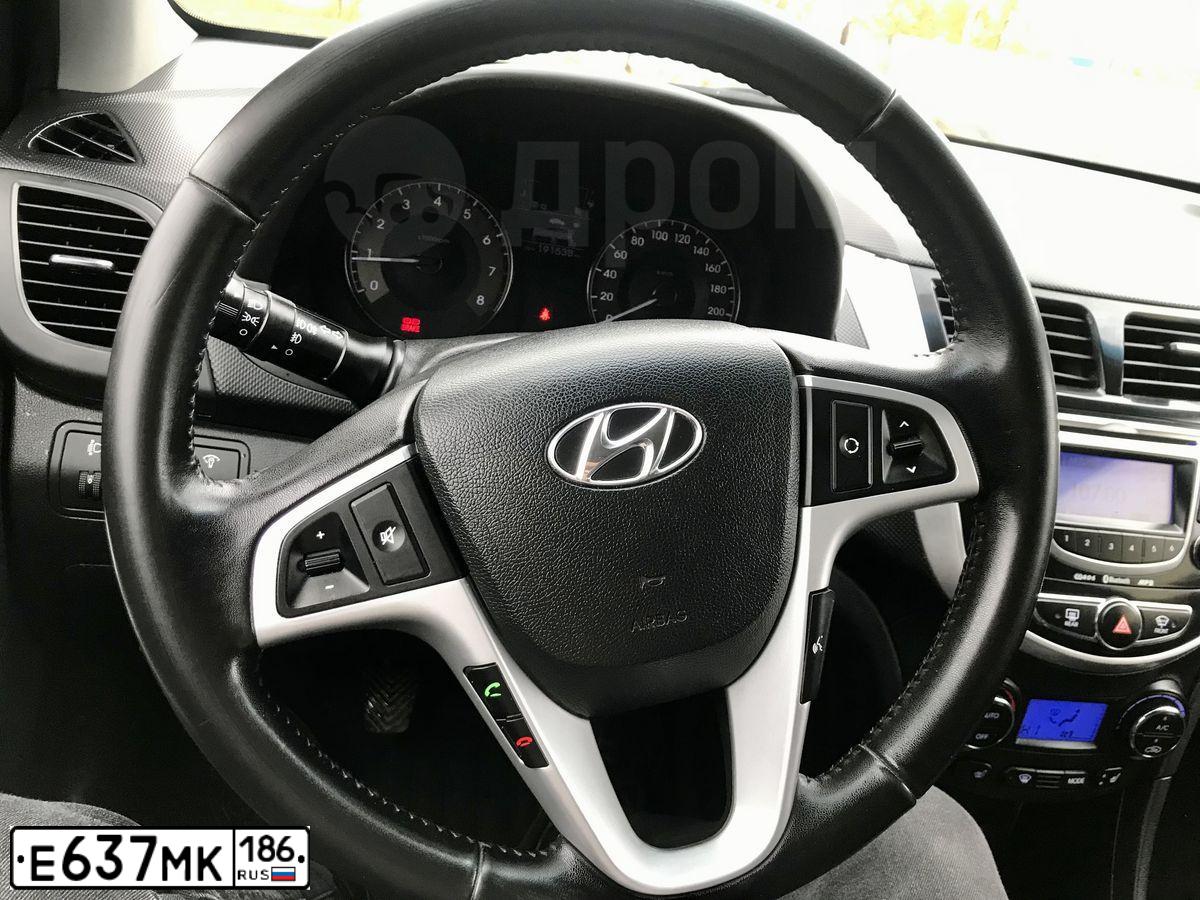 Фото автомобиля HYUNDAI SOLARIS, 2012 — госномер М049УА702. Цвет: Темно-синий