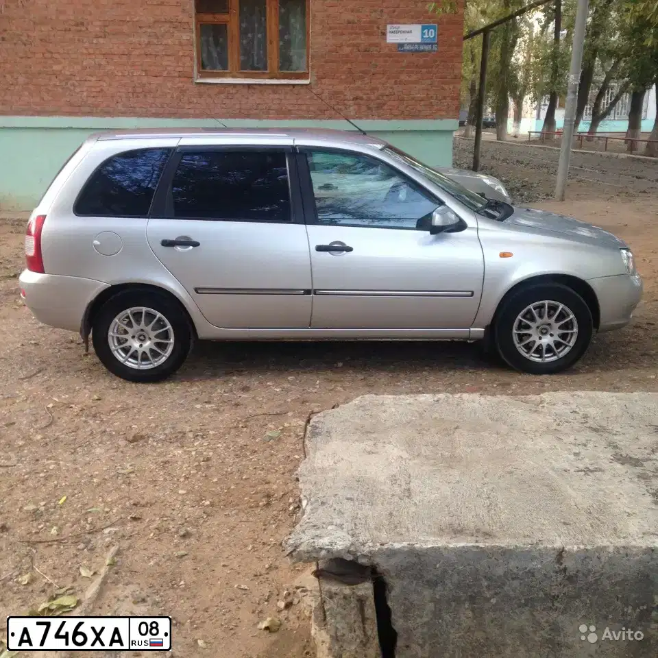 Фото автомобиля LADA 1117 KALINA, 2012 — госномер М248МТ30. Цвет: СЕРЕБРИСТЫЙ