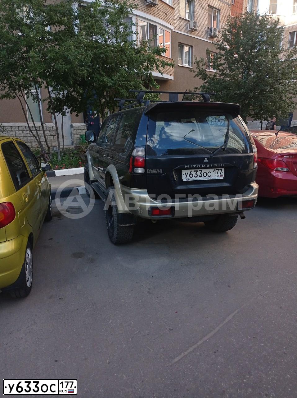 Фото автомобиля MITSUBISHI PAJERO SPORT, 2006 — госномер М111УР790. Цвет: ЧЕРНЫЙ