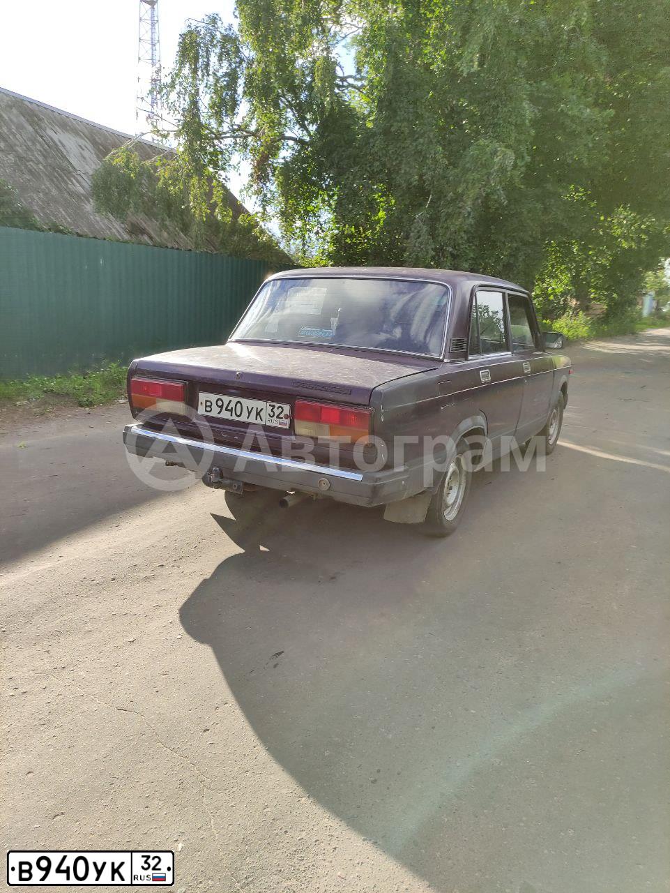Фото автомобиля LADA 2107, 1999 — госномер В940УК32. Цвет: ФИОЛЕТОВЫЙ