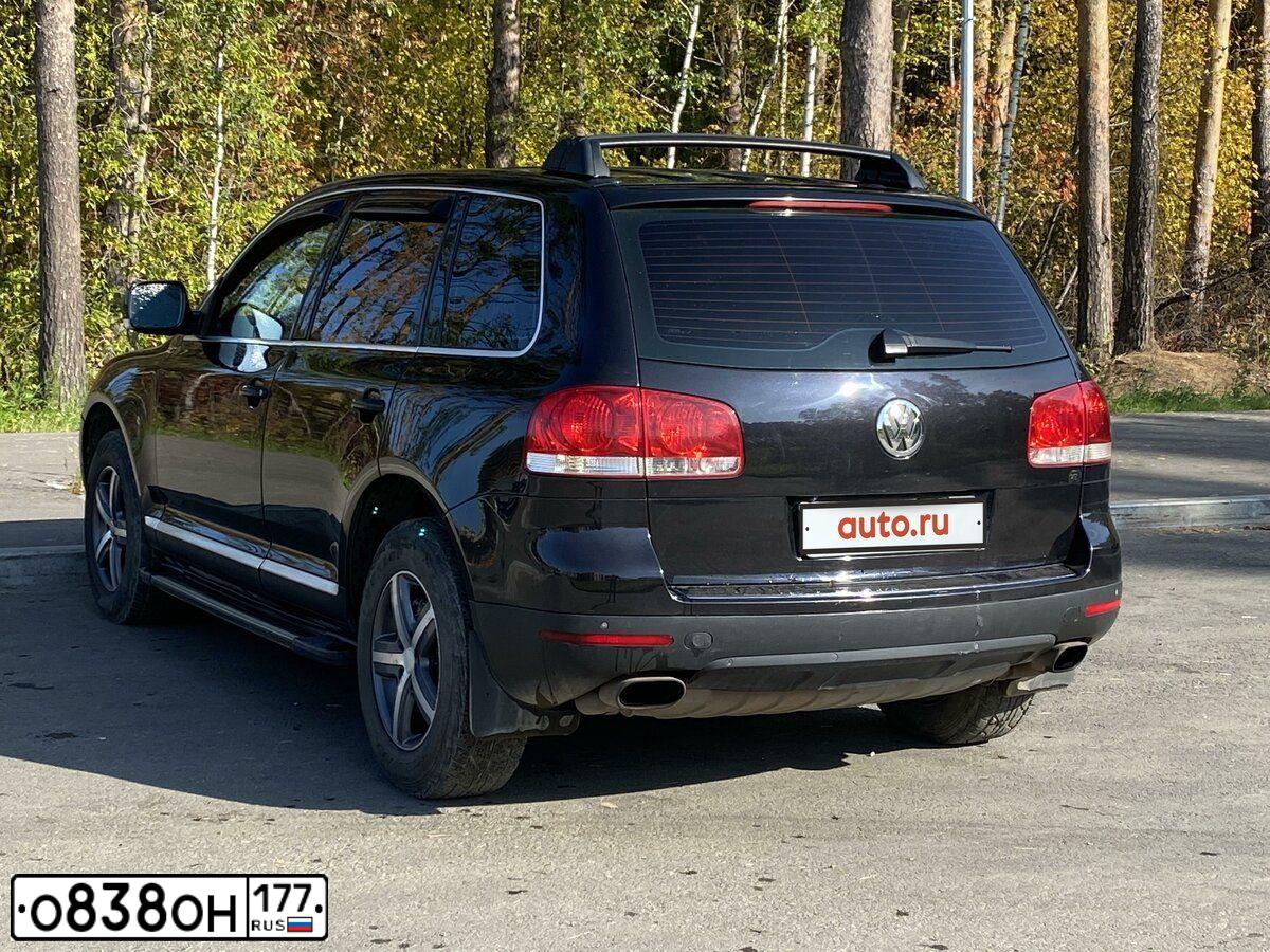Фото автомобиля VOLKSWAGEN TOUAREG, 2006 — госномер Х986ММ72. Цвет: ЧЕРНЫЙ