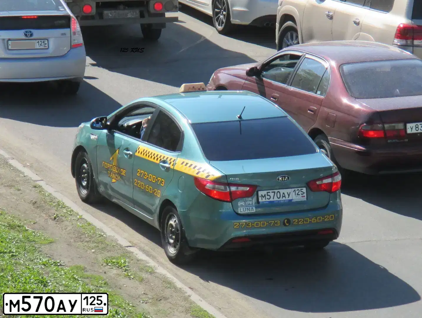 Фото автомобиля KIA RIO, 2012 — госномер К483РУ70. Цвет: СВЕТЛО-ЗЕЛЕНЫЙ