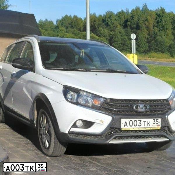 Фото автомобиля LADA 1117 KALINA, 2009 — госномер А003ТК35. Цвет: СЕРЕБРИСТО-КРАСНЫЙ