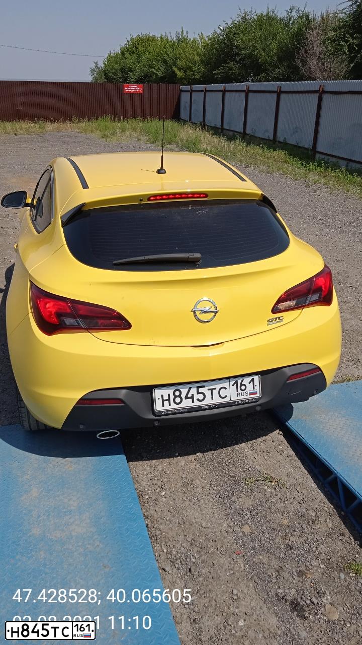 Фото автомобиля OPEL ASTRA, 2012 — госномер Н845ТС161. Цвет: ЖЕЛТЫЙ