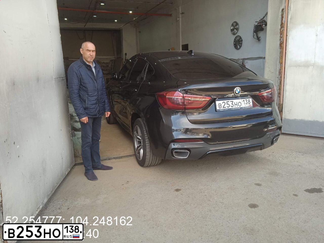 Фото автомобиля BMW X6, 2016 — госномер В253НО138. Цвет: ЧЕРНЫЙ