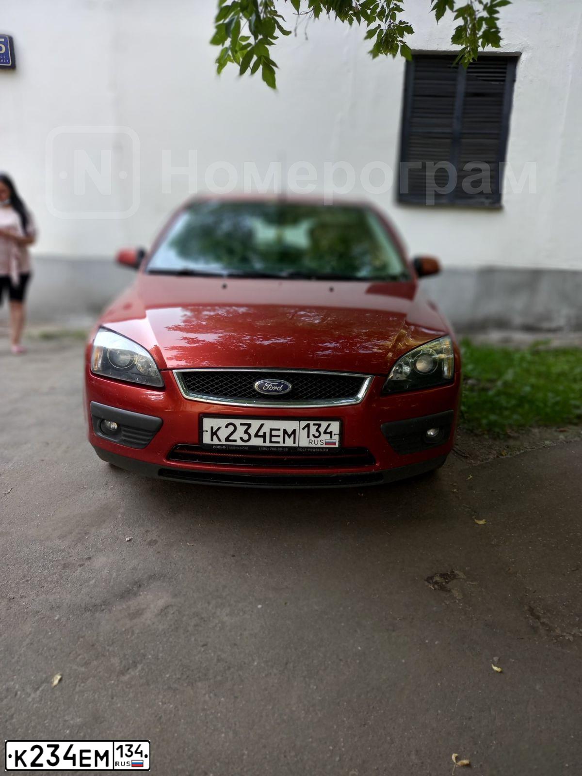 Фото автомобиля FORD FOCUS, 2007 — госномер Р932ВВ48. Цвет: КРАСНО-ОРАНЖЕВЫЙ